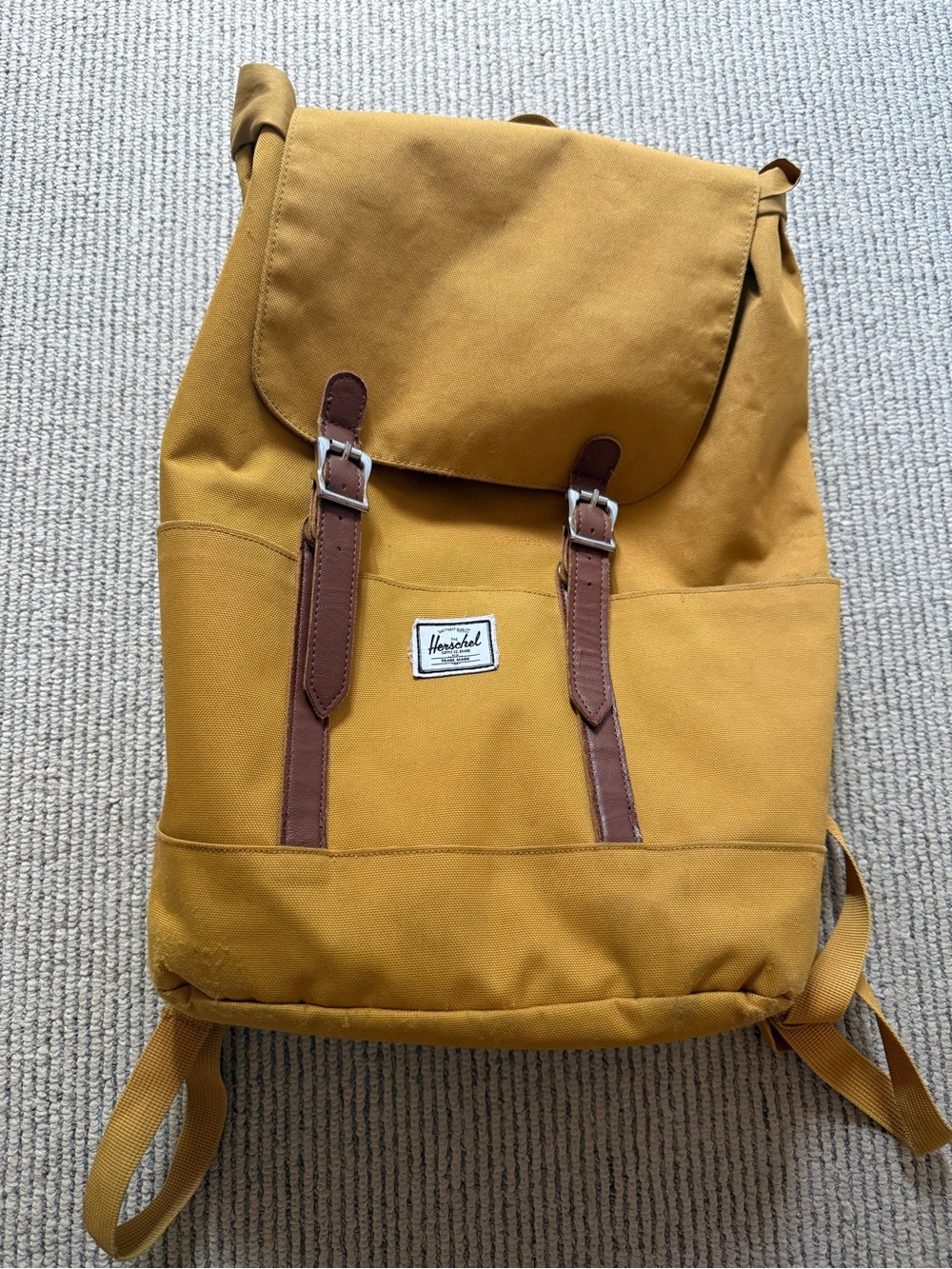 Mustard yellow Herschel backpack